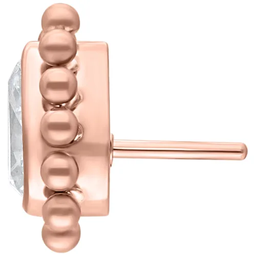 Roségoldener Piercingaufsatz mit klaren Kristallen auf weißem Hintergrund