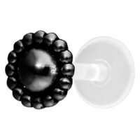 Schwarzes Nub Labret mit Push-Fit Mechanismus auf weißem Hintergrund