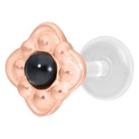 Roségoldenes Push-Fit Labret mit schwarzem Stein auf weißem Hintergrund